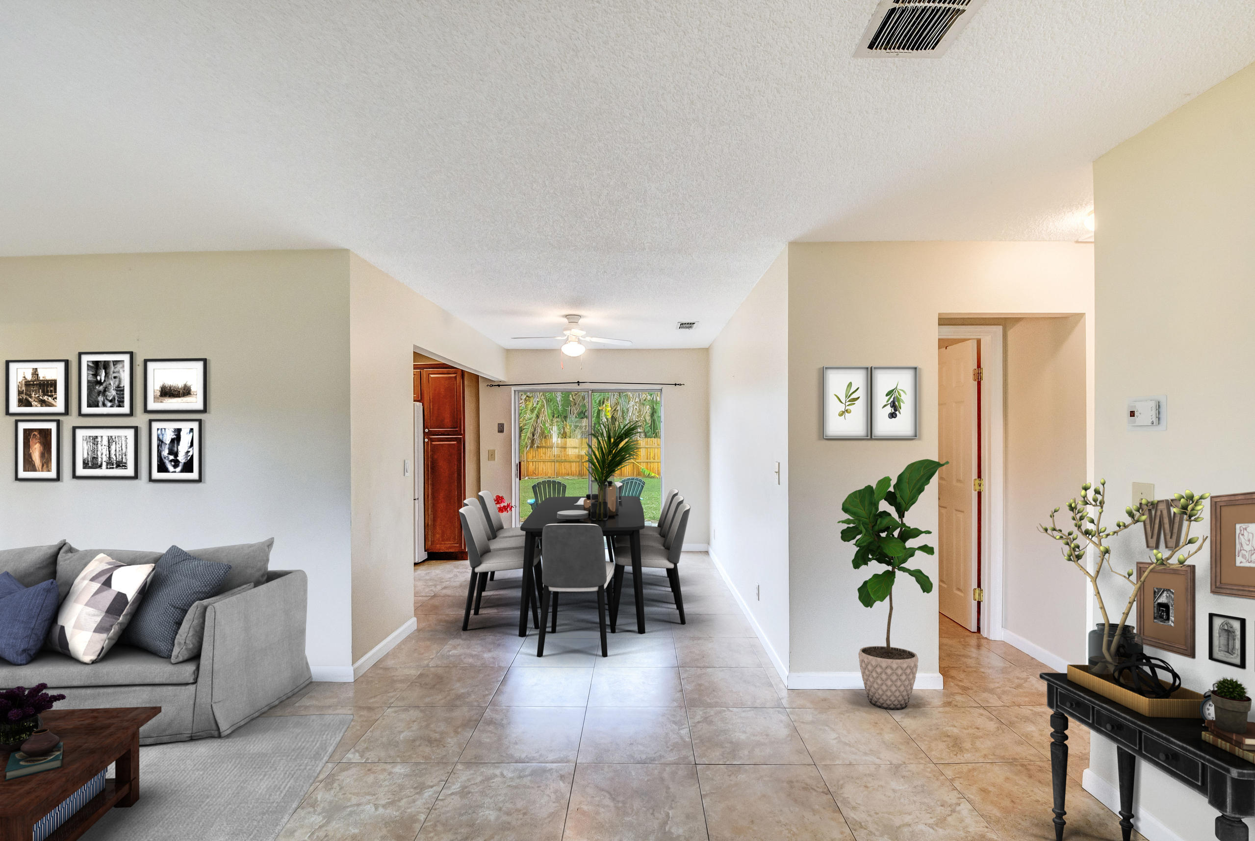 19594 Liberty Road Boca Raton, FL 33434 - Photo 16 of 53 a living room with furniture and flowers