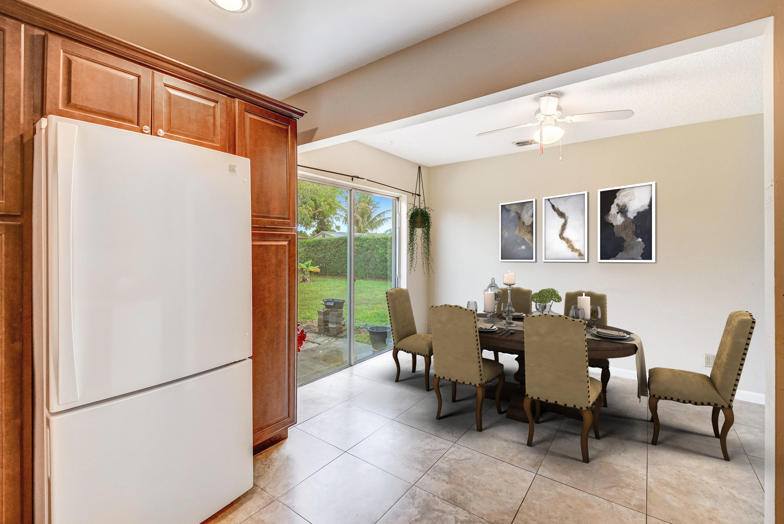19594 Liberty Road Boca Raton, FL 33434 - Photo 23 of 53 a dining room with furniture and a window