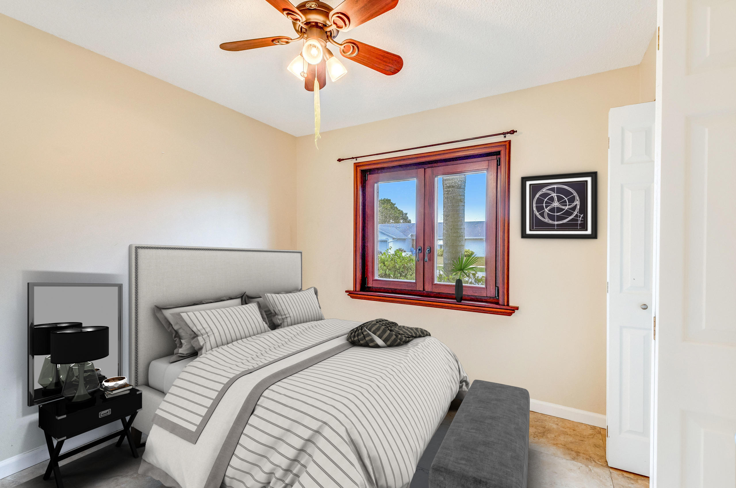 19594 Liberty Road Boca Raton, FL 33434 - Photo 31 of 53 a bedroom with a bed and a chandelier