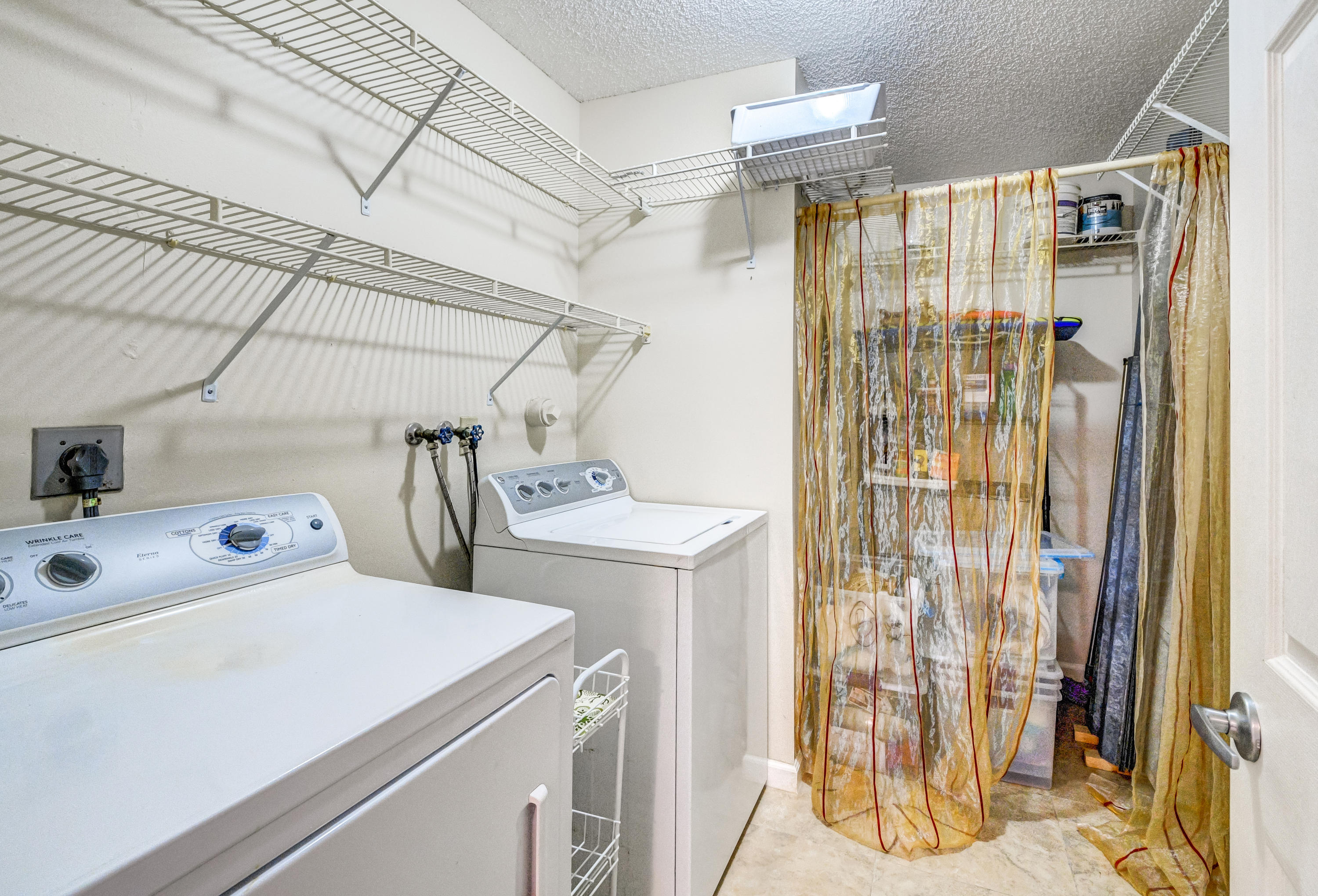 19594 Liberty Road Boca Raton, FL 33434 - Photo 36 of 53 a utility room with dryer and washer