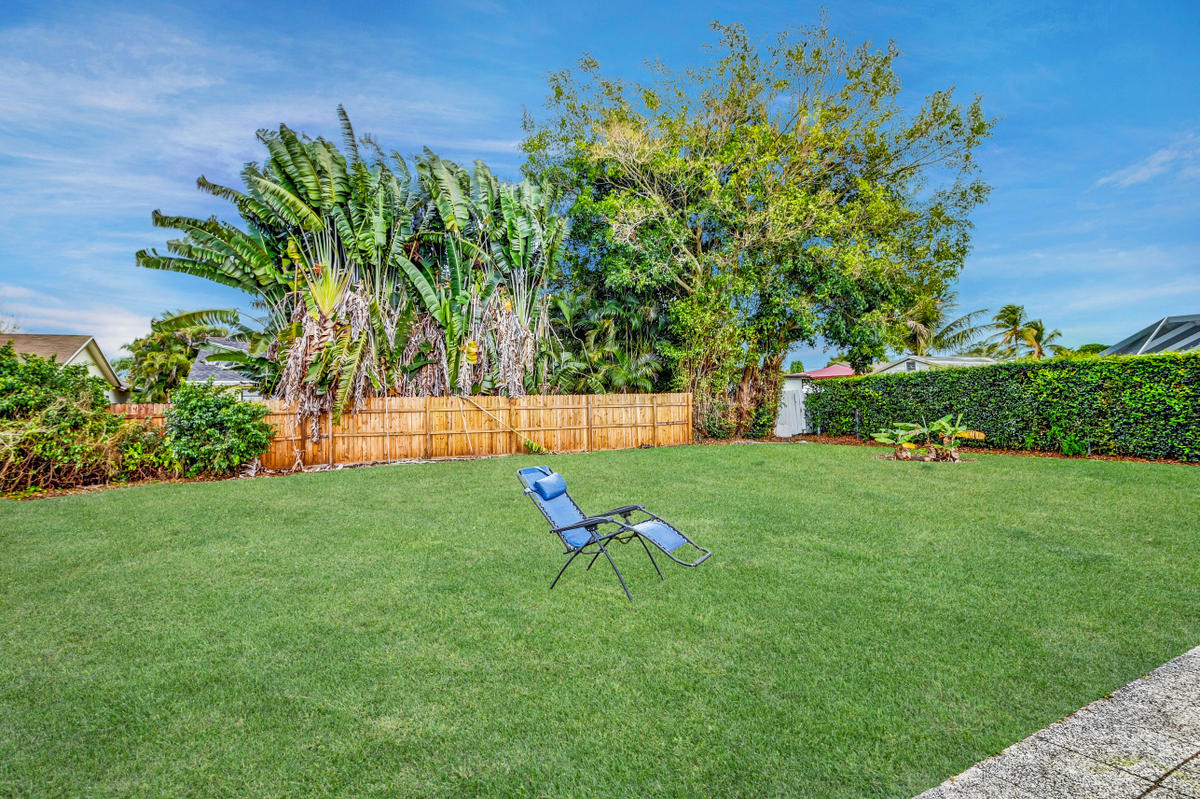 19594 Liberty Road Boca Raton, FL 33434 - Photo 37 of 53 a view of a backyard with a garden