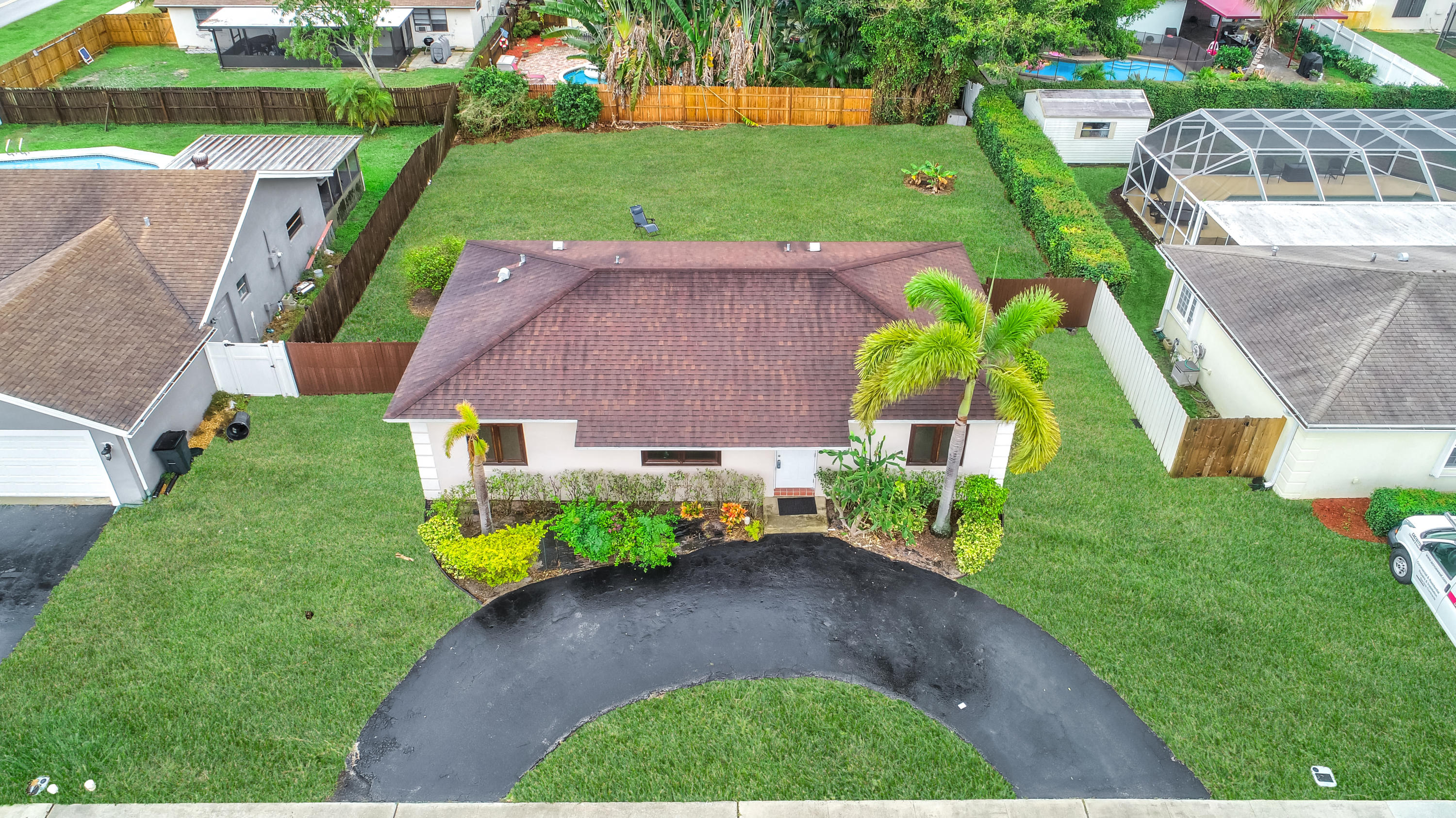 19594 Liberty Road Boca Raton, FL 33434 - Photo 41 of 53 an aerial view of a house with a yard and a sitting area