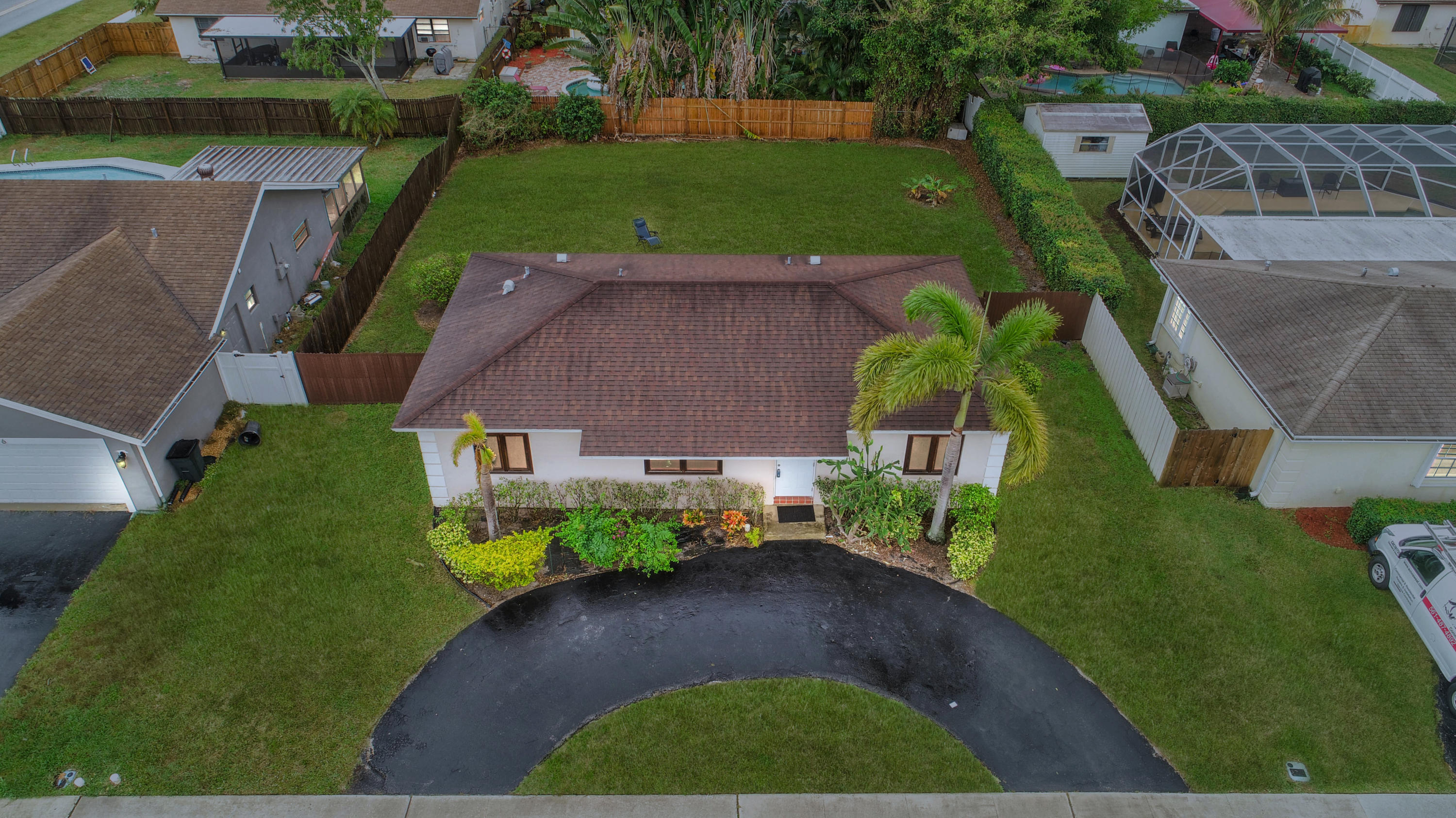 19594 Liberty Road Boca Raton, FL 33434 - Photo 42 of 53 an aerial view of a house with a garden and yard