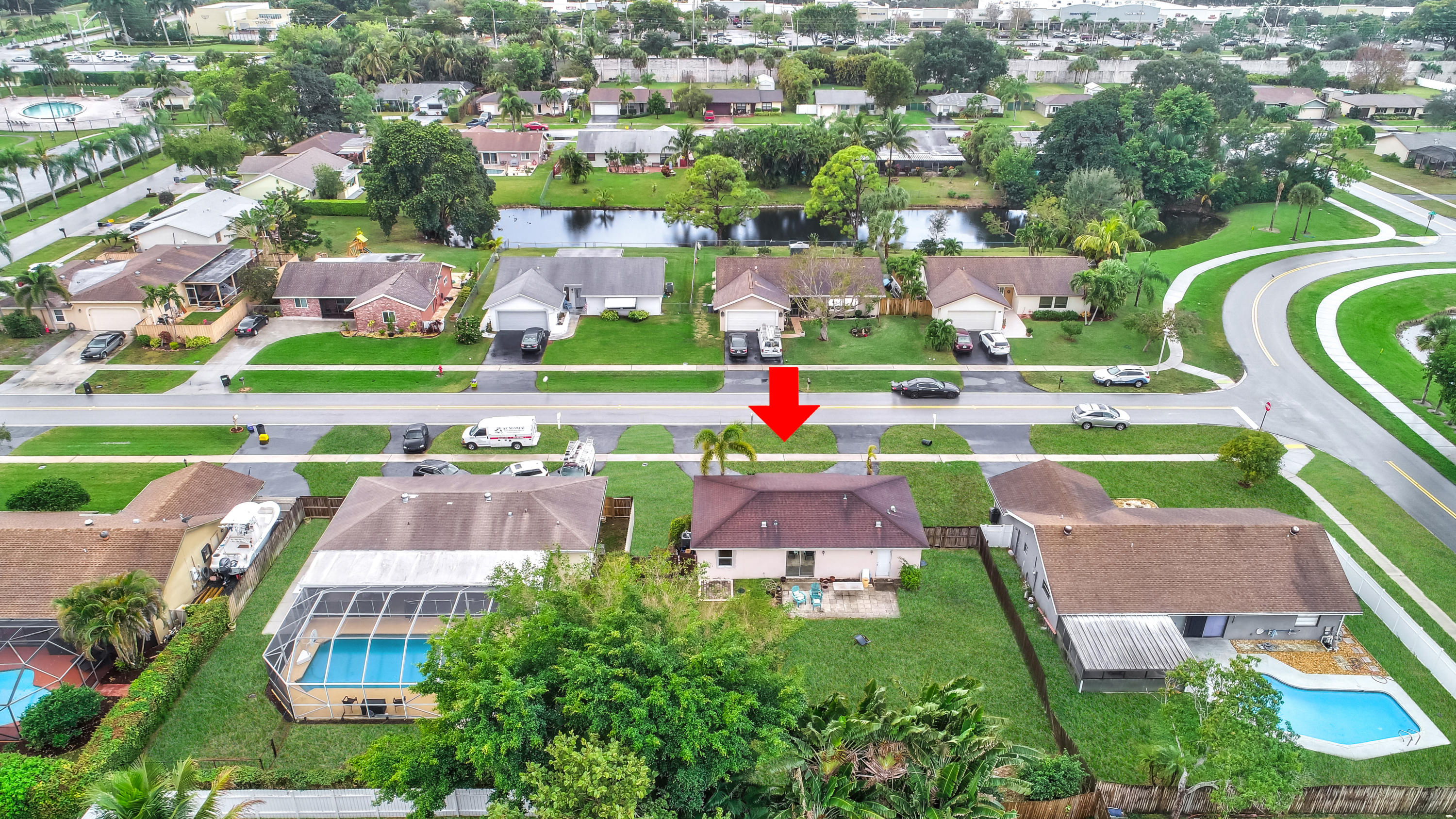 19594 Liberty Road Boca Raton, FL 33434 - Photo 47 of 53 an aerial view of a house with a swimming pool yard and outdoor seating