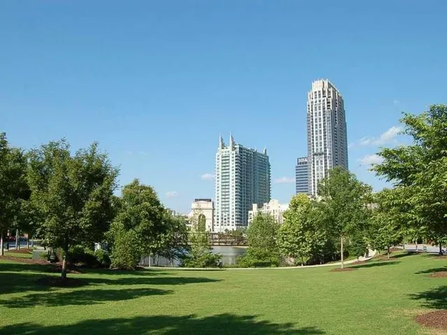 a view of a city with tall buildings