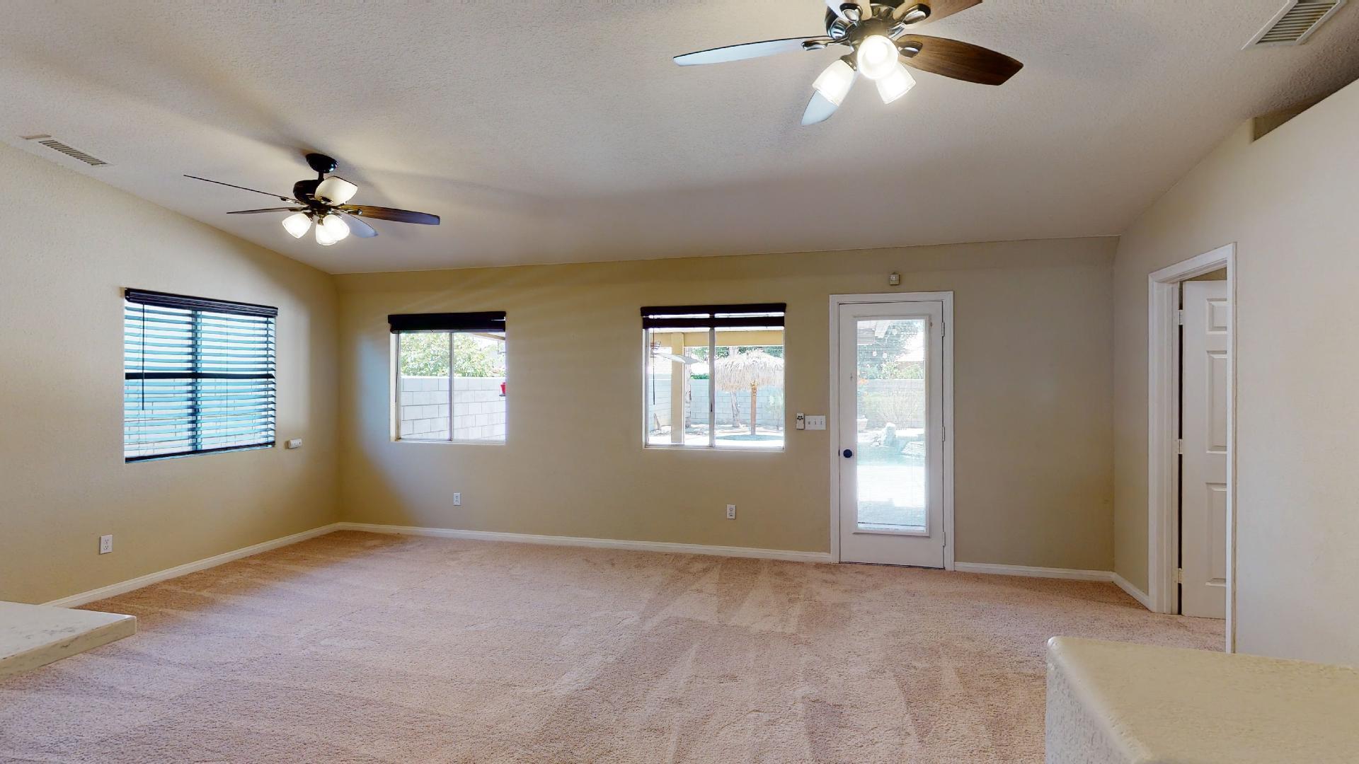 68373 Durango Road Cathedral City, CA 92234 - Photo 22 of 44 a view of an empty room with a window