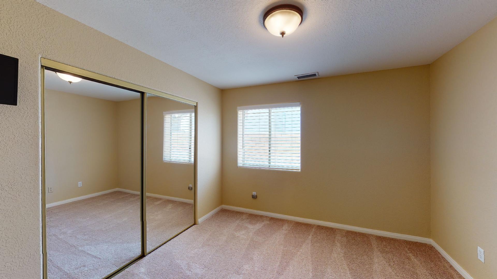 68373 Durango Road Cathedral City, CA 92234 - Photo 34 of 44 an empty room with windows