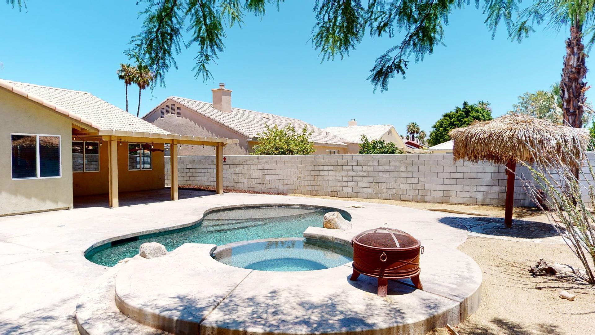 68373 Durango Road Cathedral City, CA 92234 - Photo 5 of 44 a view of a swimming pool with a patio