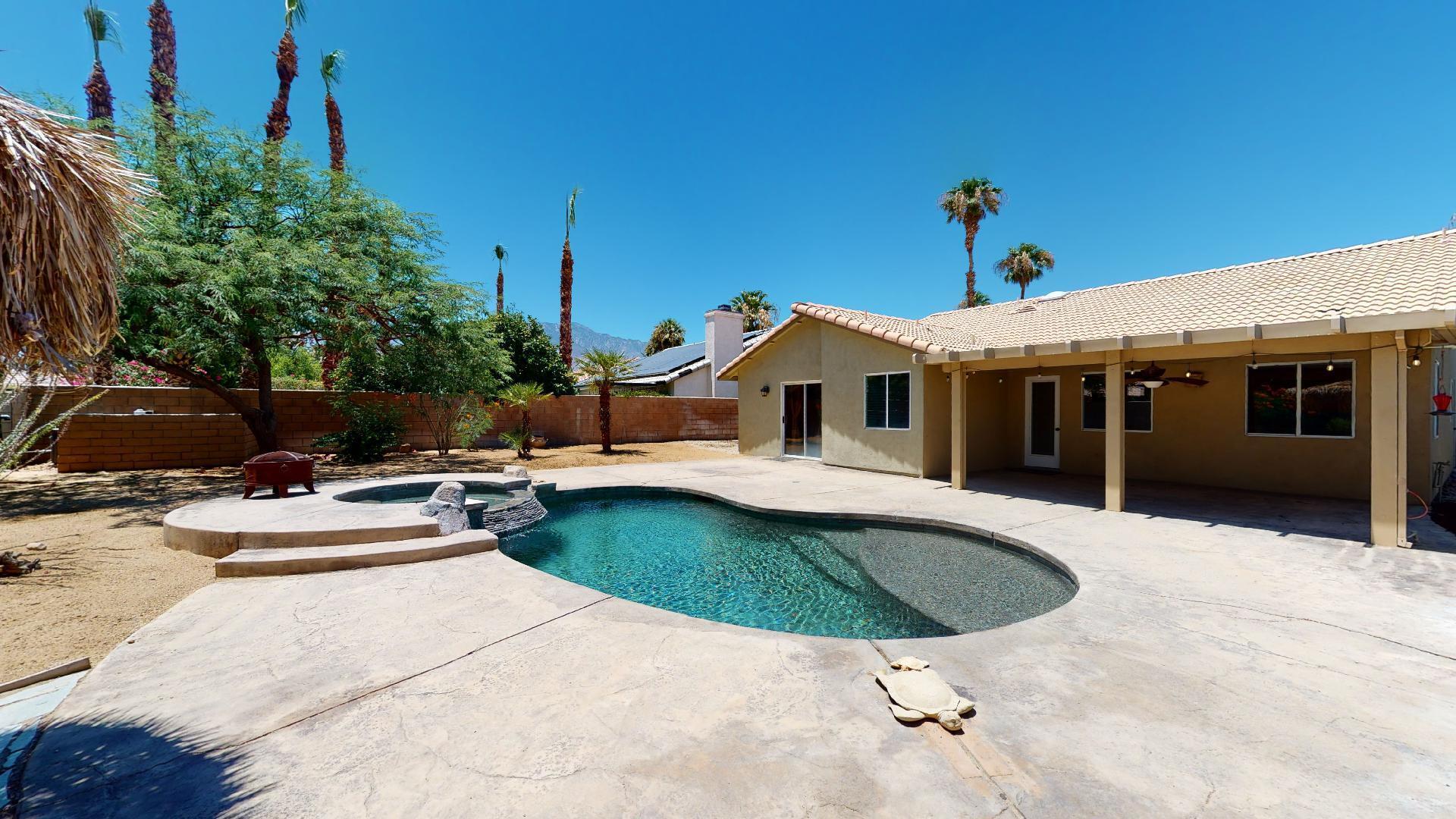68373 Durango Road Cathedral City, CA 92234 - Photo 7 of 44 a swimming pool with outdoor seating