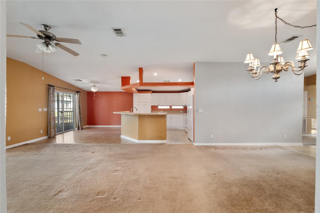 7863 Southwest 6th Place Ocala, FL 34474 - Photo 25 of 60 a view of a room with a chandelier