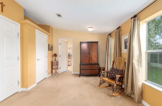 a bathroom with a sink vanity and a mirror