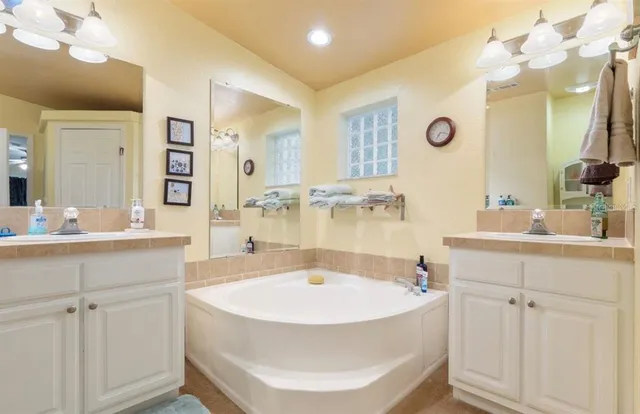 a work room with furniture and a window