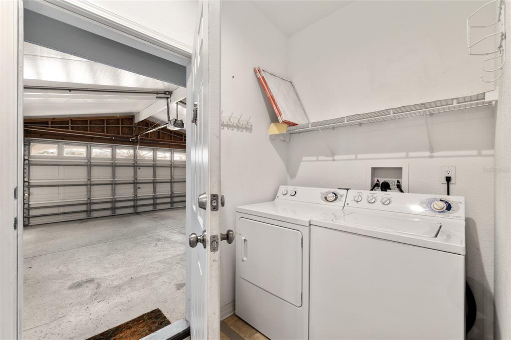 7863 Southwest 6th Place Ocala, FL 34474 - Photo 46 of 60 a utility room with dryer and washer