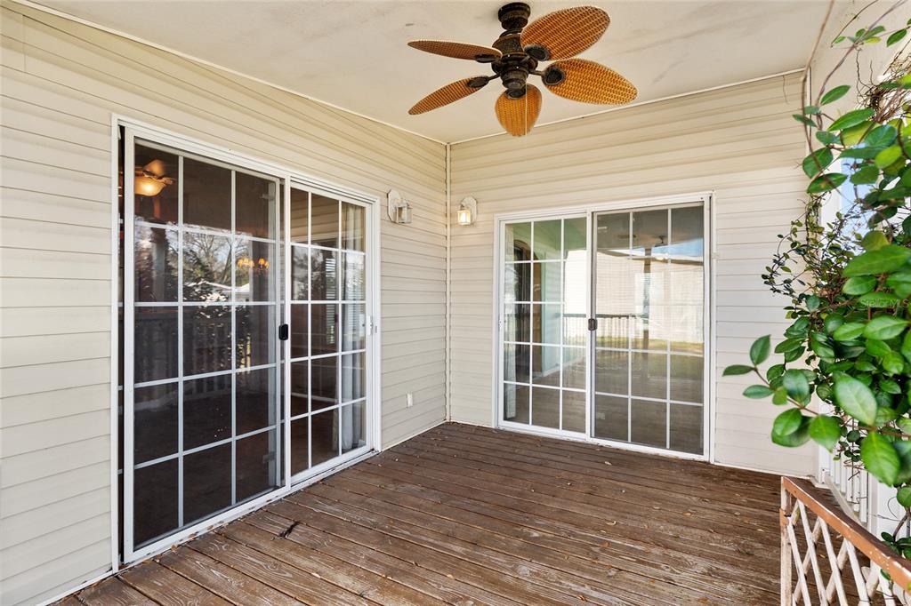 7863 Southwest 6th Place Ocala, FL 34474 - Photo 51 of 60 a view of a room with a large window and wooden floor