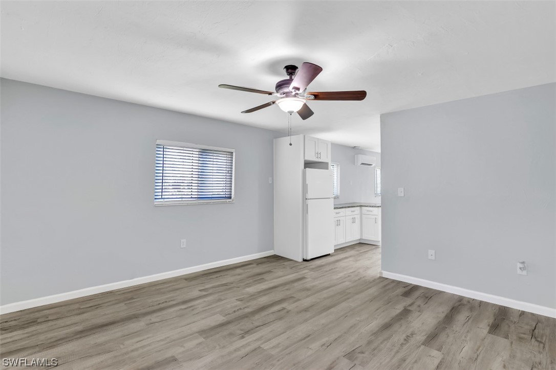 8109 Country Road, Unit 103 Fort Myers, FL 33919 - Photo 3 of 19 a view of an empty room with a window