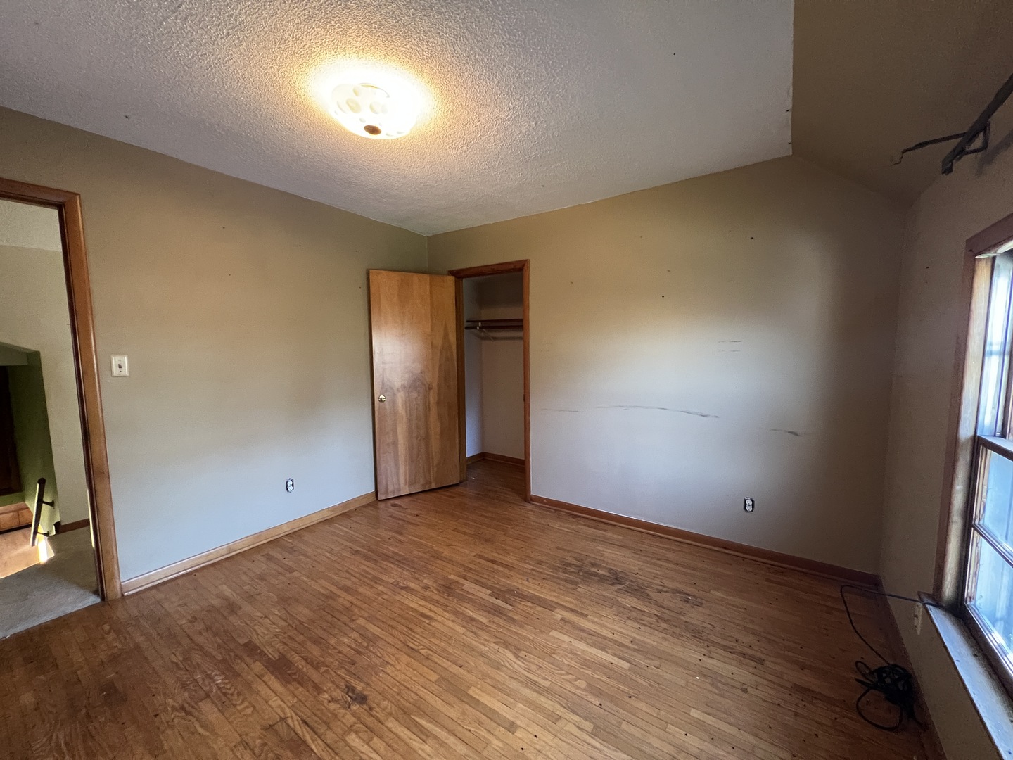 48W137 Middleton Road Maple Park, IL 60151 - Photo 15 of 27 an empty room with wooden floor and windows
