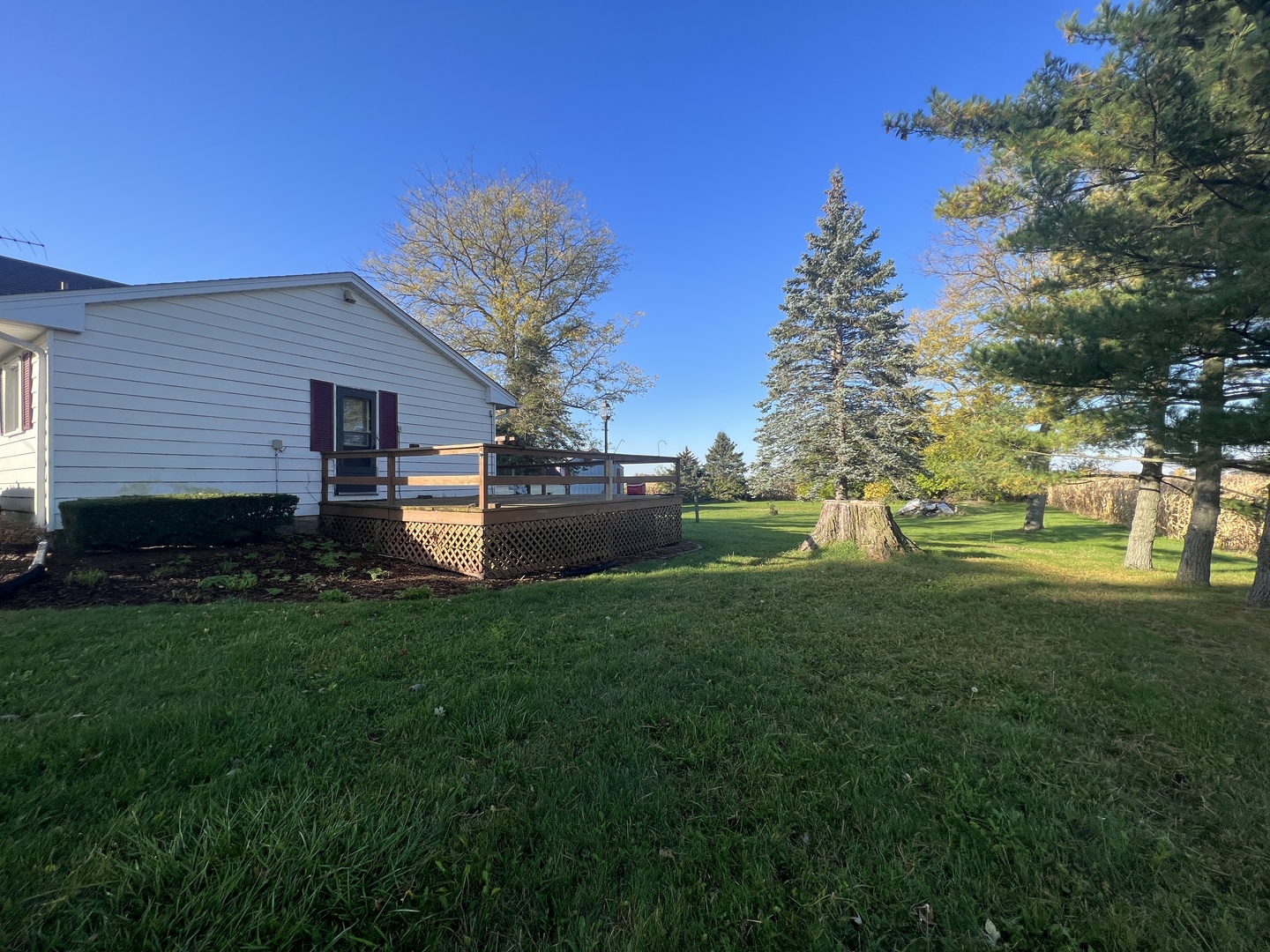 48W137 Middleton Road Maple Park, IL 60151 - Photo 20 of 27 a view of a house with backyard sitting area and garden