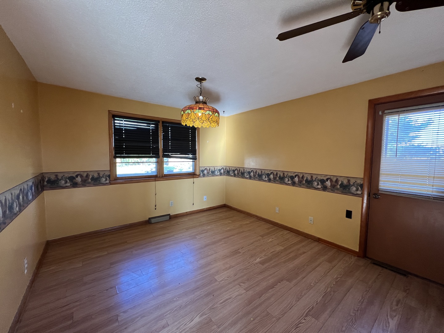 48W137 Middleton Road Maple Park, IL 60151 - Photo 10 of 27 a view of a room with wooden floors and stairs