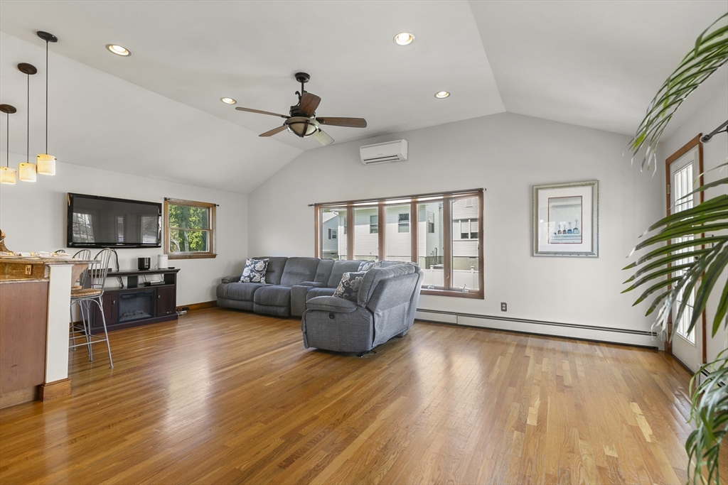 16 Homer Road Arlington, MA 02476 - Photo 13 of 28 a living room with furniture and a wooden floor