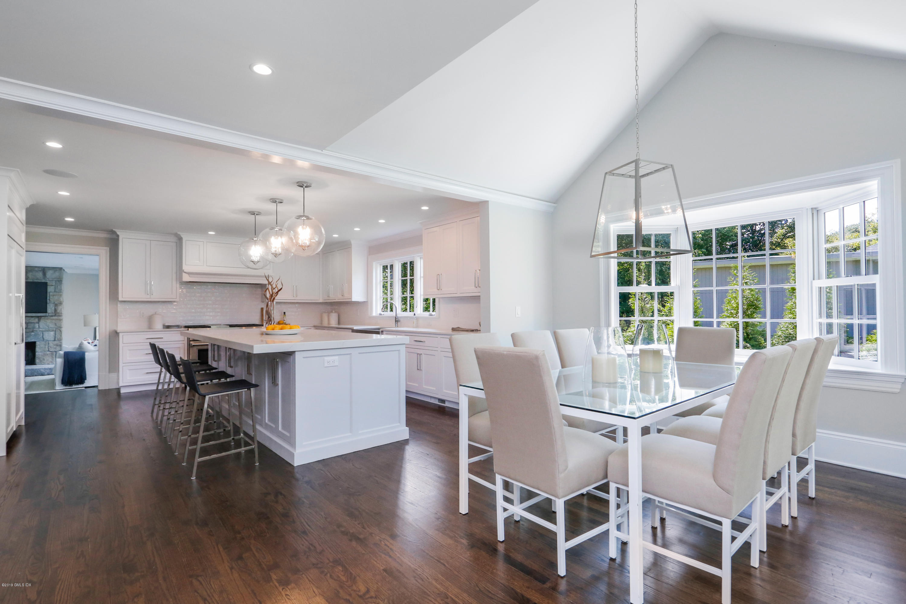 101 Dingletown Road Greenwich, CT 06830 - Photo 11 of 40 a view of a dining room with furniture window and wooden floor
