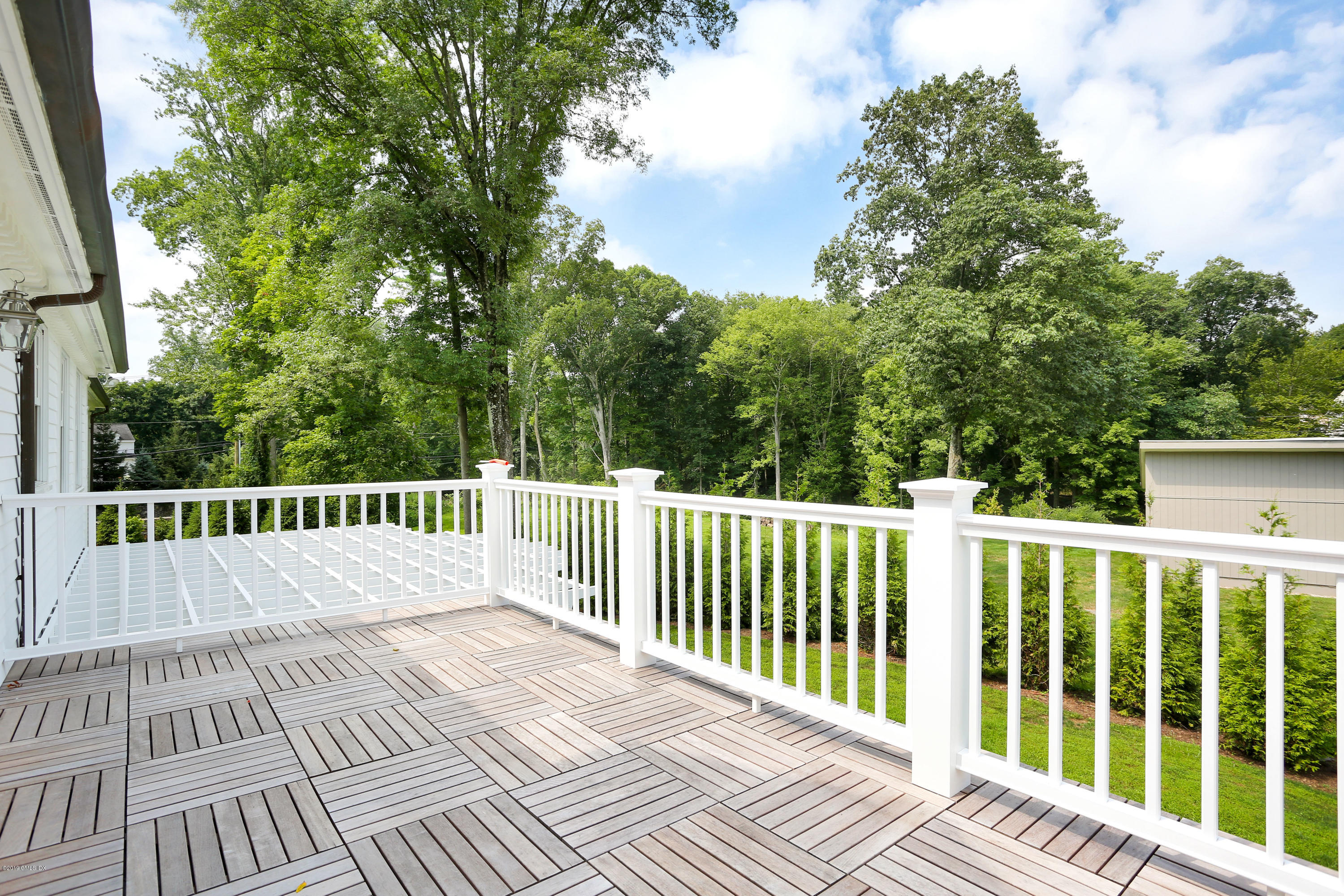 101 Dingletown Road Greenwich, CT 06830 - Photo 28 of 40 a view of a wooden deck