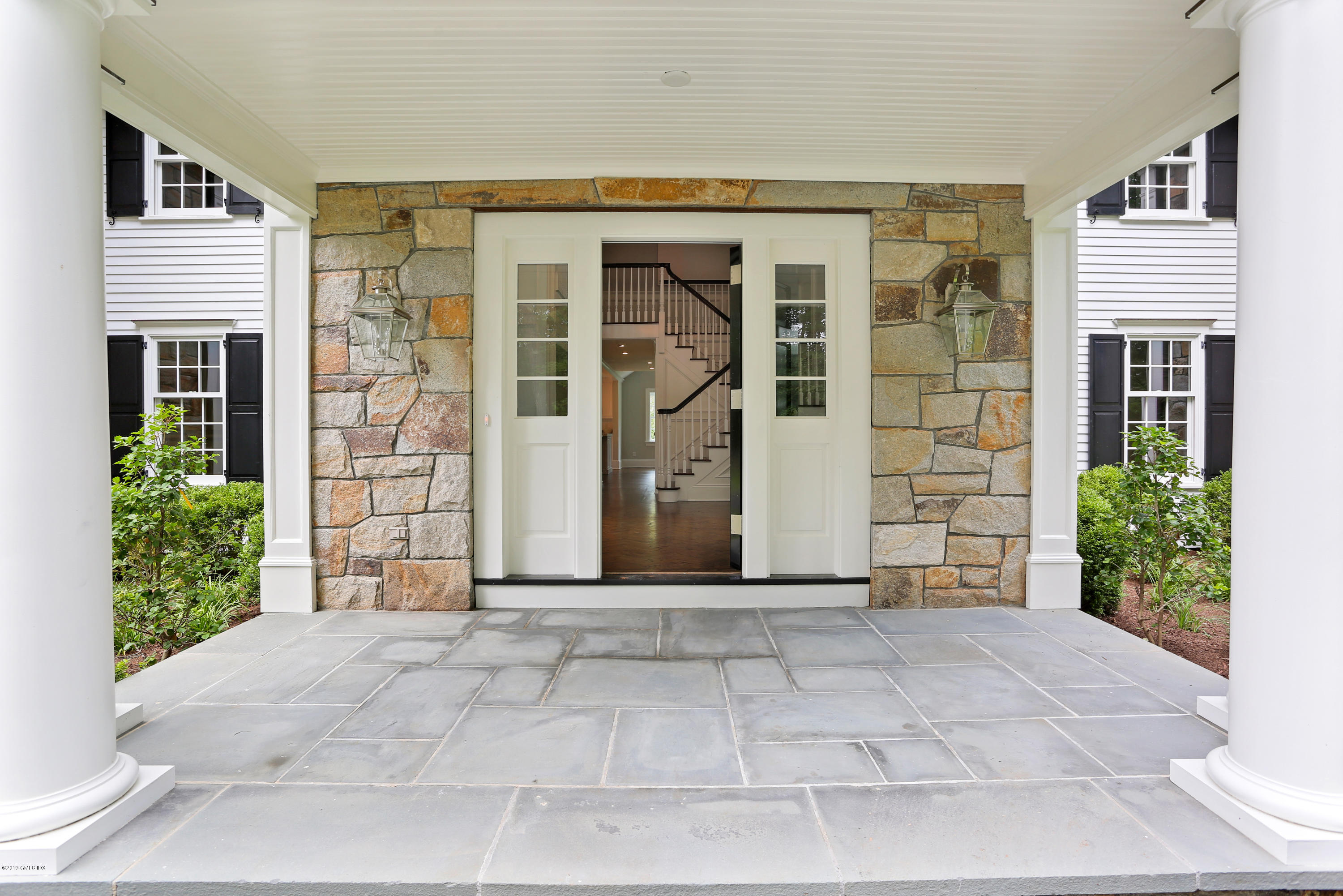 101 Dingletown Road Greenwich, CT 06830 - Photo 3 of 40 front view of a house with a porch