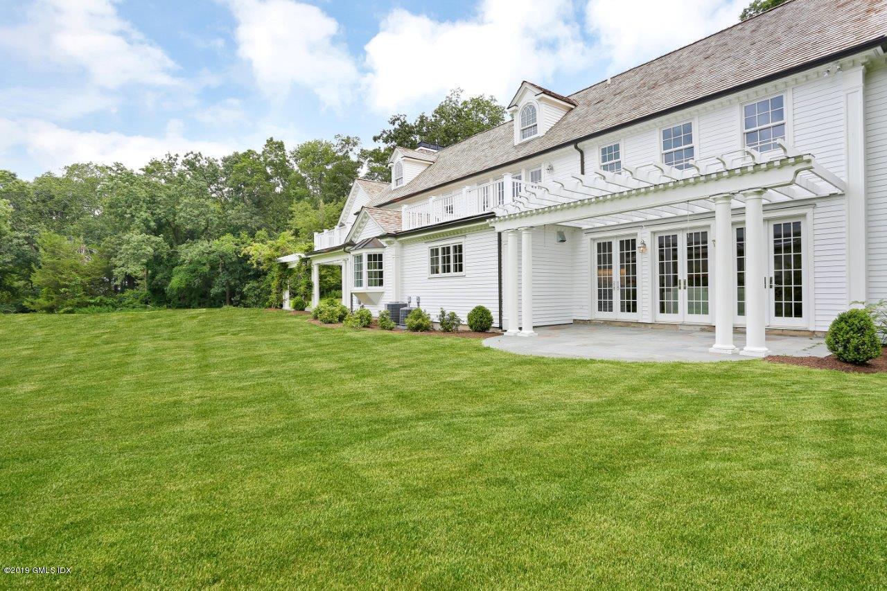 101 Dingletown Road Greenwich, CT 06830 - Photo 35 of 40 a view of a house with a backyard