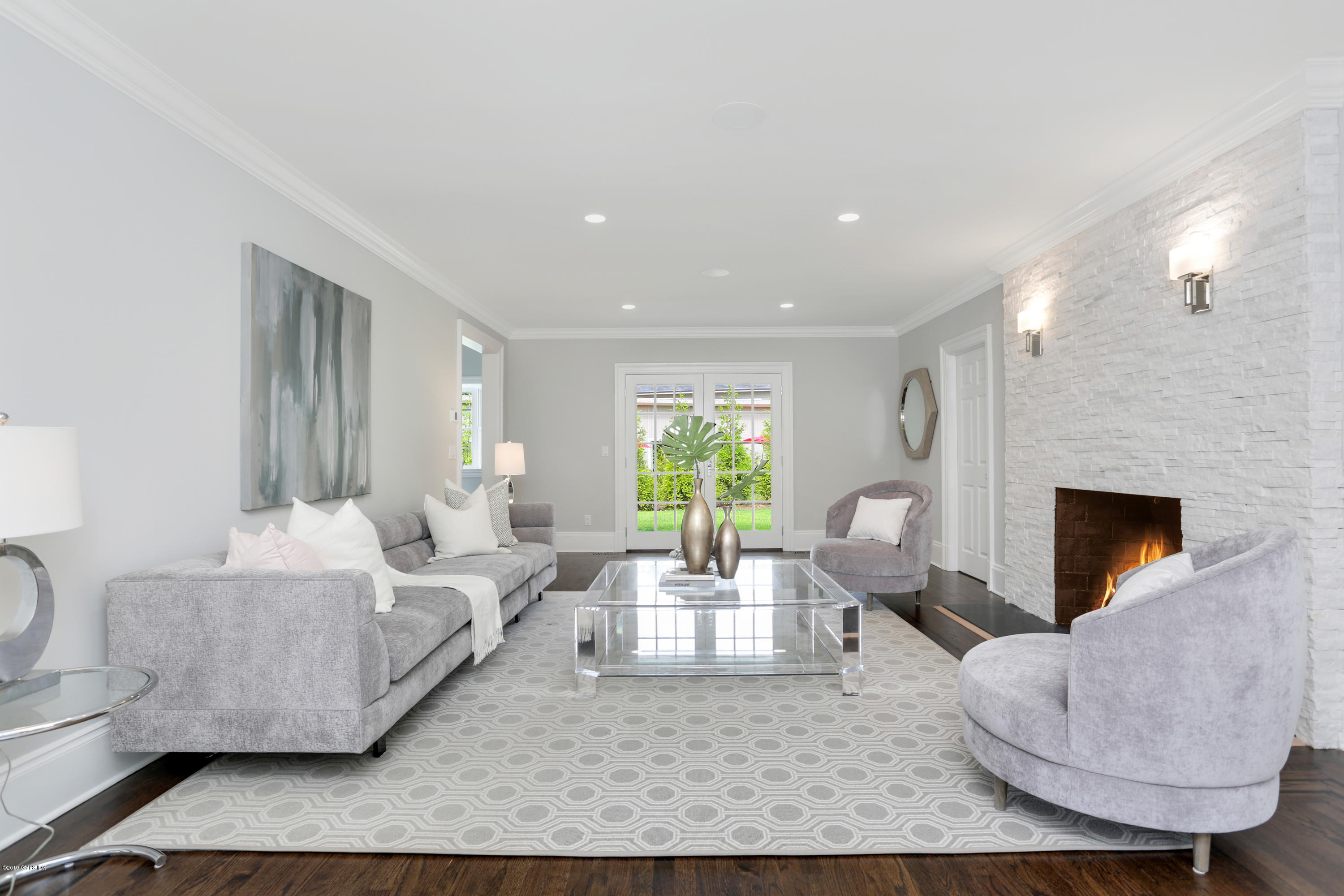 101 Dingletown Road Greenwich, CT 06830 - Photo 6 of 40 a living room with furniture and a fireplace