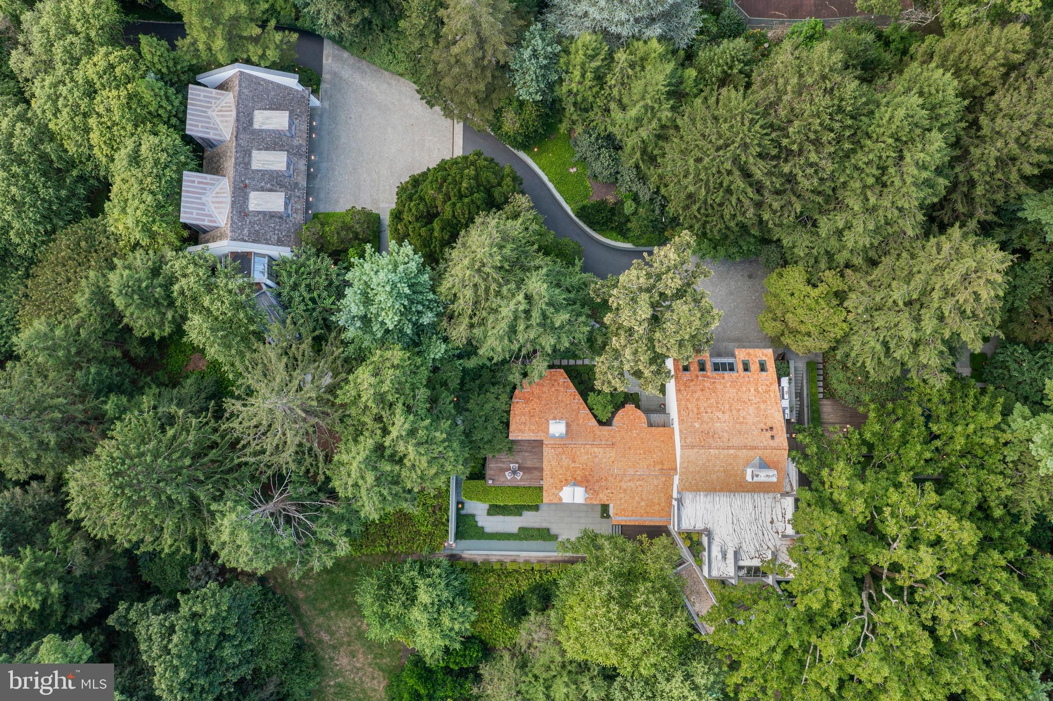 308-310 Julip Run Wayne, PA 19087 - Photo 122 of 127 an aerial view of a house with a yard and large trees