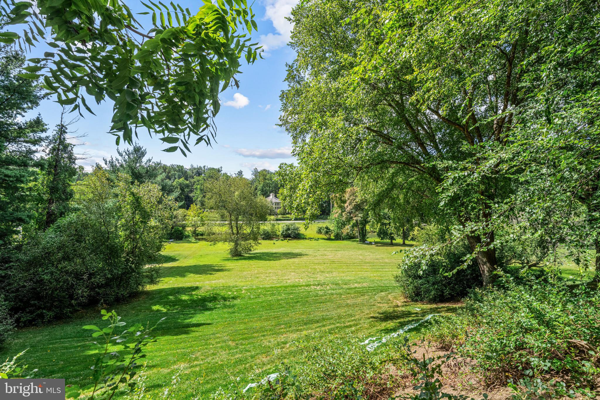 308-310 Julip Run Wayne, PA 19087 - Photo 123 of 127 a view of a golf course with a lake