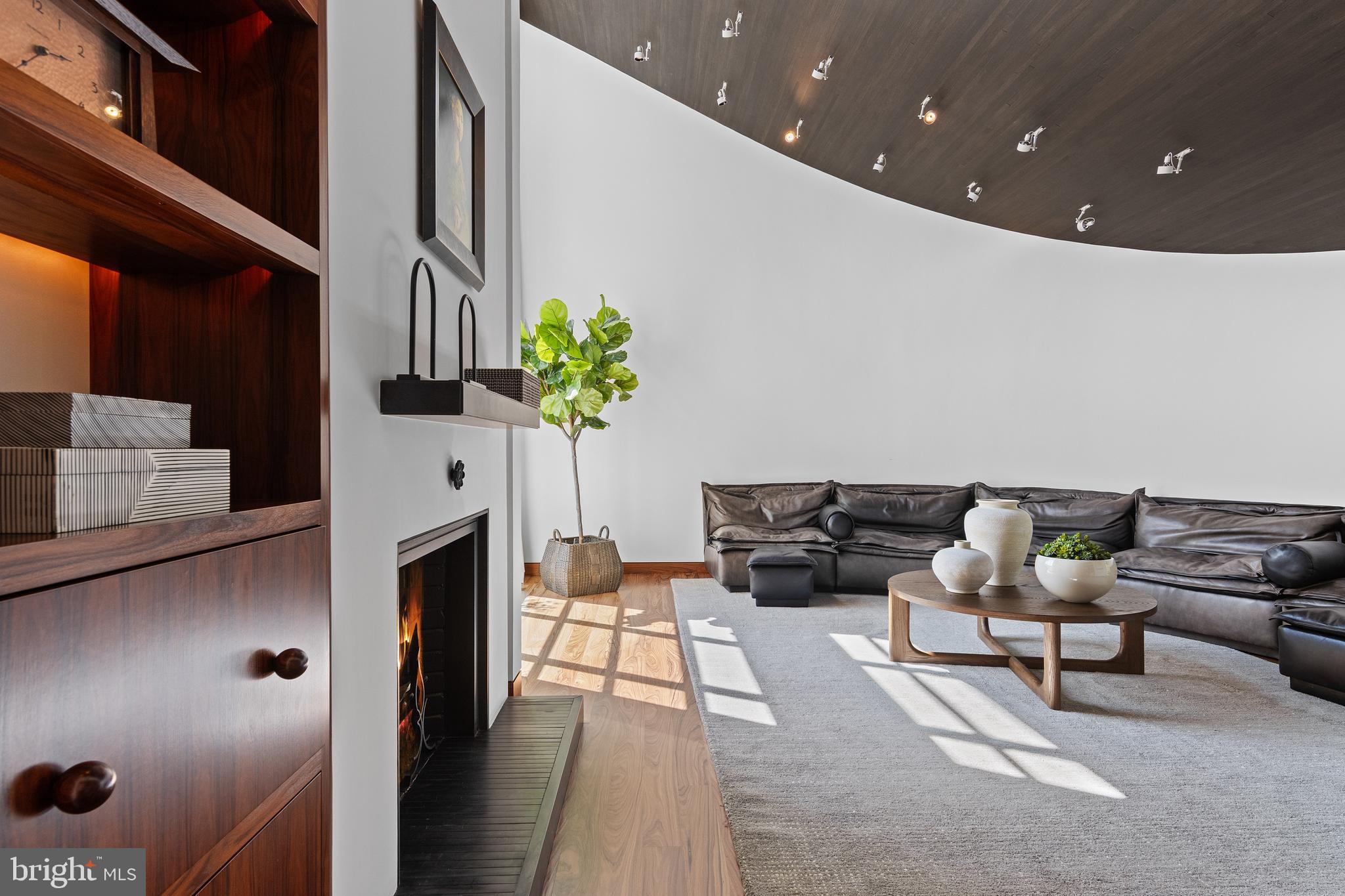 308-310 Julip Run Wayne, PA 19087 - Photo 19 of 127 a living room with furniture and a fireplace