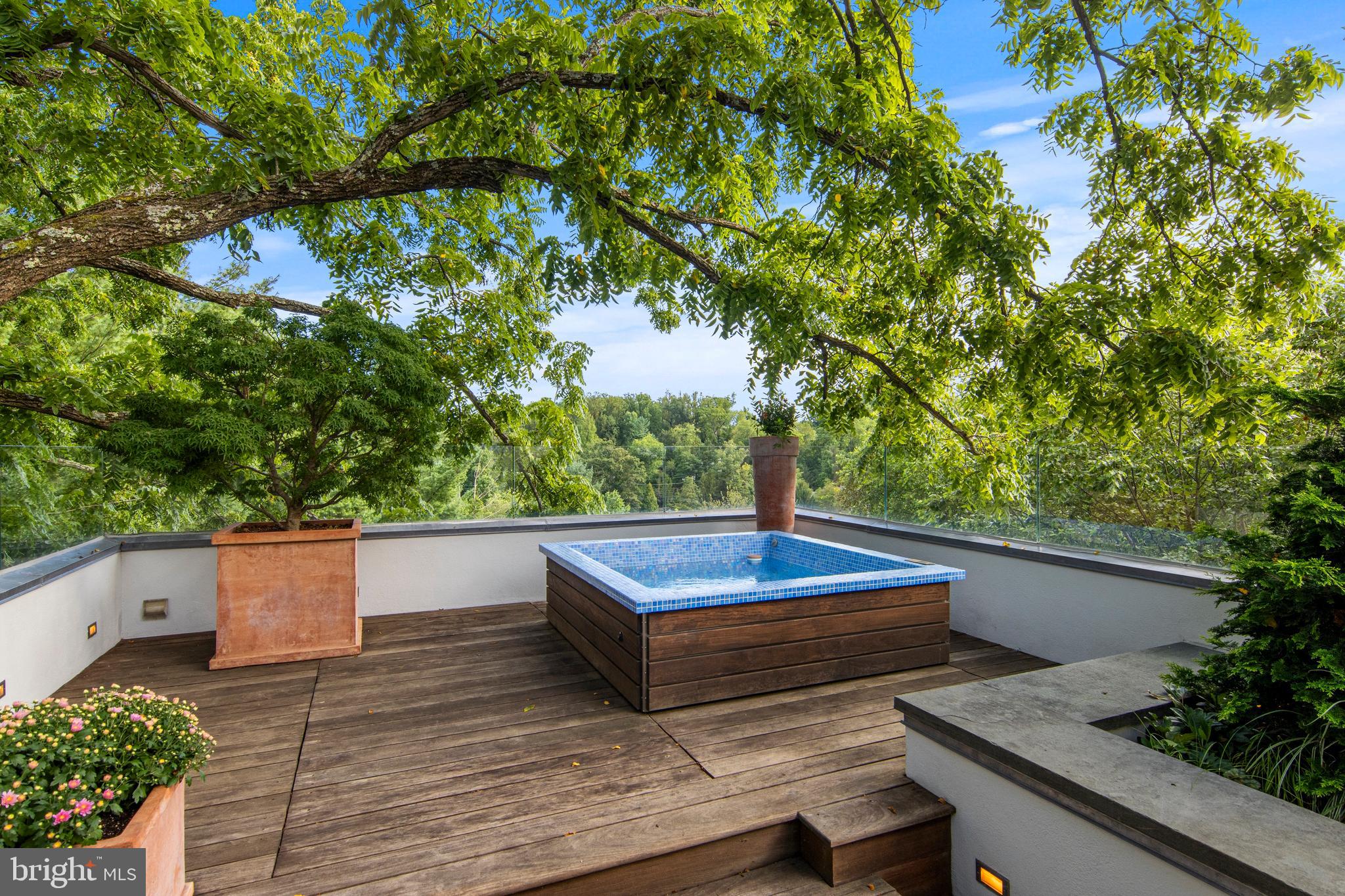 308-310 Julip Run Wayne, PA 19087 - Photo 54 of 127 a view of a wooden deck with a tree
