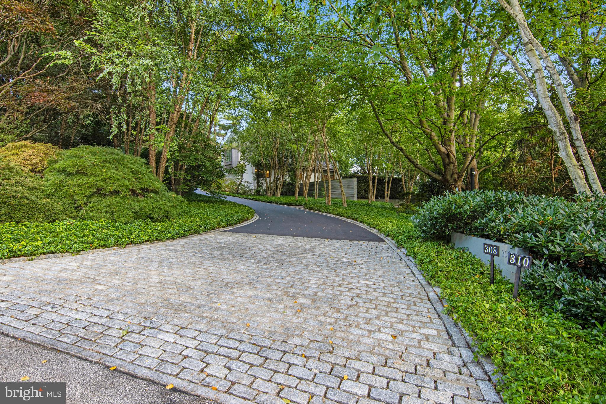 308-310 Julip Run Wayne, PA 19087 - Photo 6 of 127 a view of a street with a trees