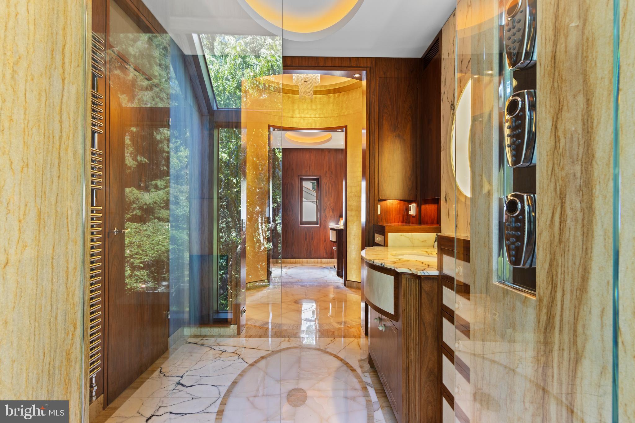 308-310 Julip Run Wayne, PA 19087 - Photo 61 of 127 a en suite bathroom with a granite countertop shower a sink and a mirror