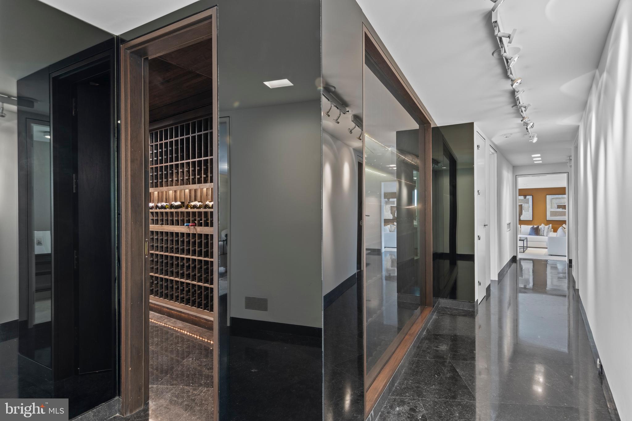 308-310 Julip Run Wayne, PA 19087 - Photo 76 of 127 a view of hallway with walk in closet and wooden floor