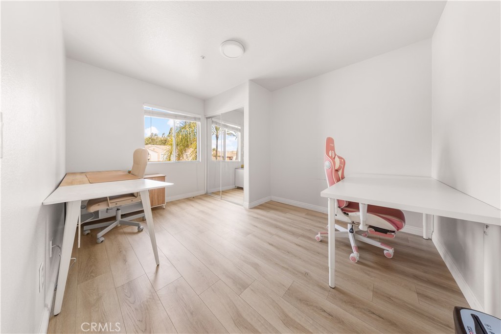 2 Cameron Circle Lake Forest, CA 92610 - Photo 22 of 45 a living room with furniture and a wooden floor