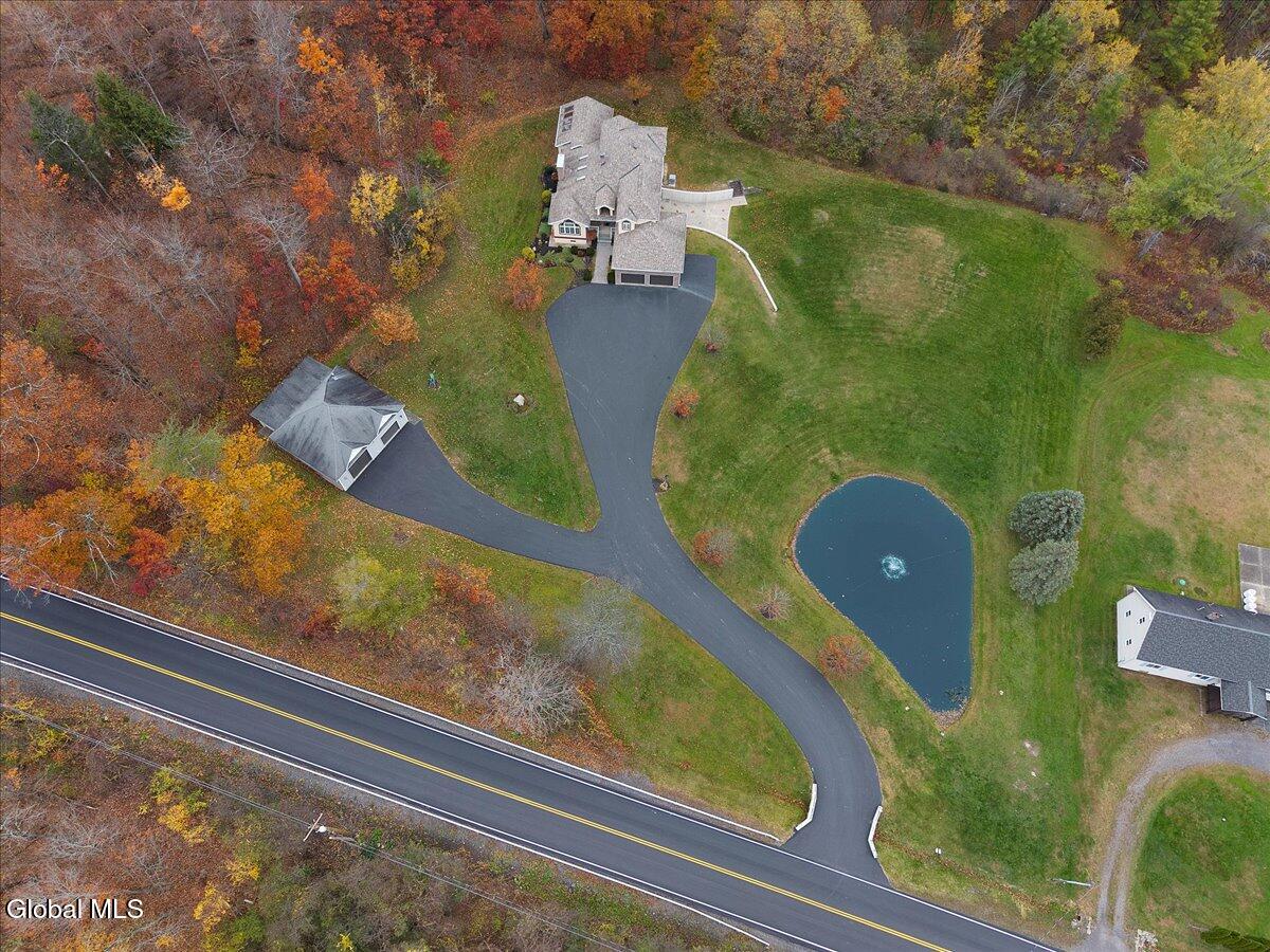 1306 Putnam Road Rotterdam, NY 12306 - Photo 6 of 76 52-DJI_20251105092056_0636_D