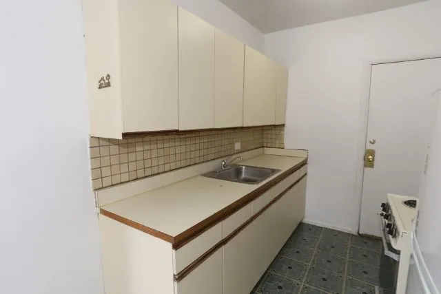 a utility room with a sink