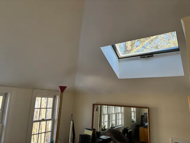 a view of an empty room and window