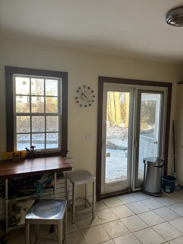 a view of room with furniture and a window