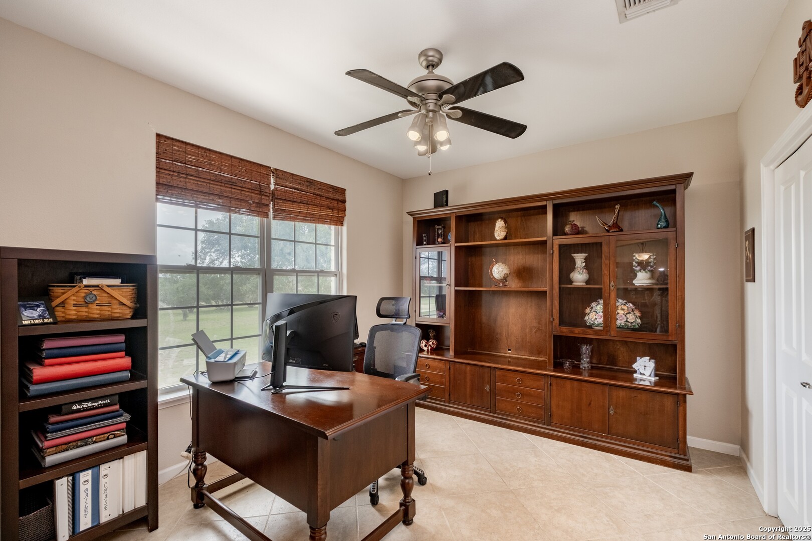 233 N Fork Bandera, TX 78003 - Photo 16 of 71 a living room with furniture a air conditioner and a window
