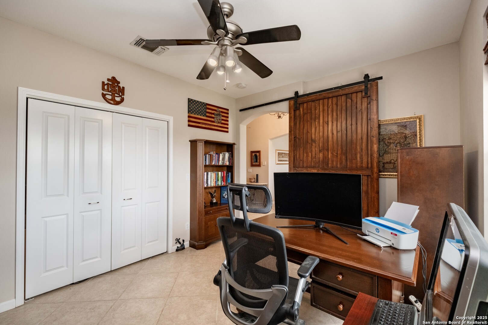 233 N Fork Bandera, TX 78003 - Photo 17 of 71 a workspace with furniture and screen