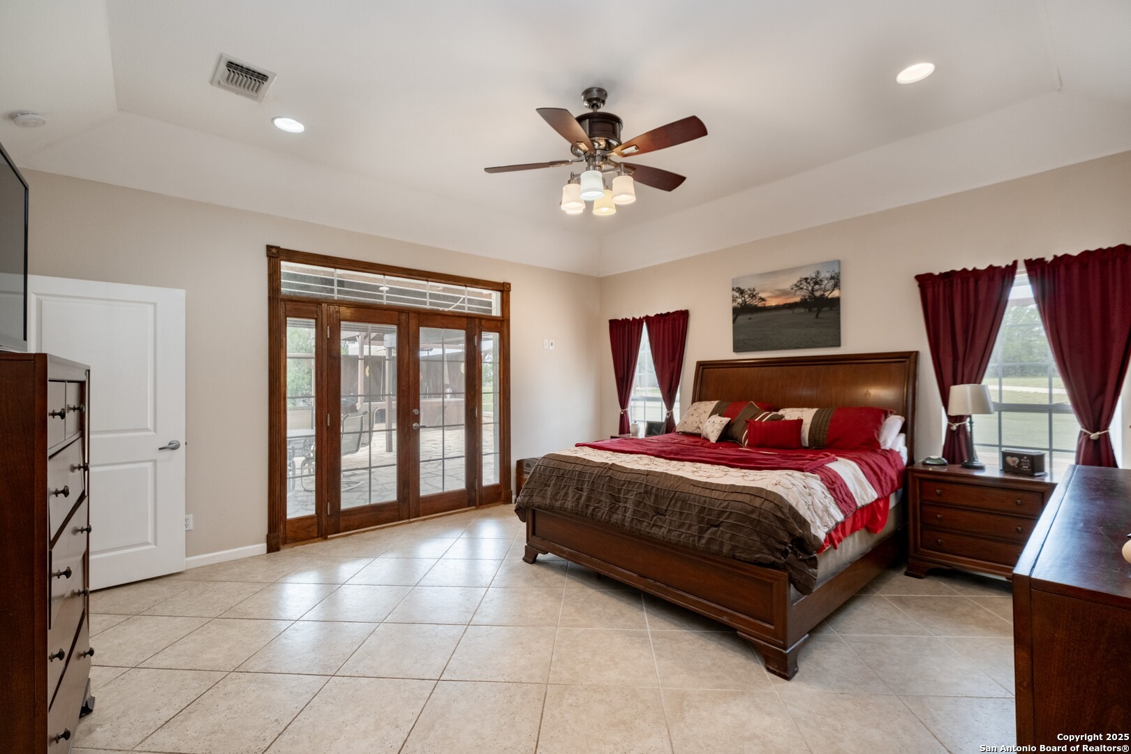 233 N Fork Bandera, TX 78003 - Photo 18 of 71 a spacious bedroom with a bed and a window