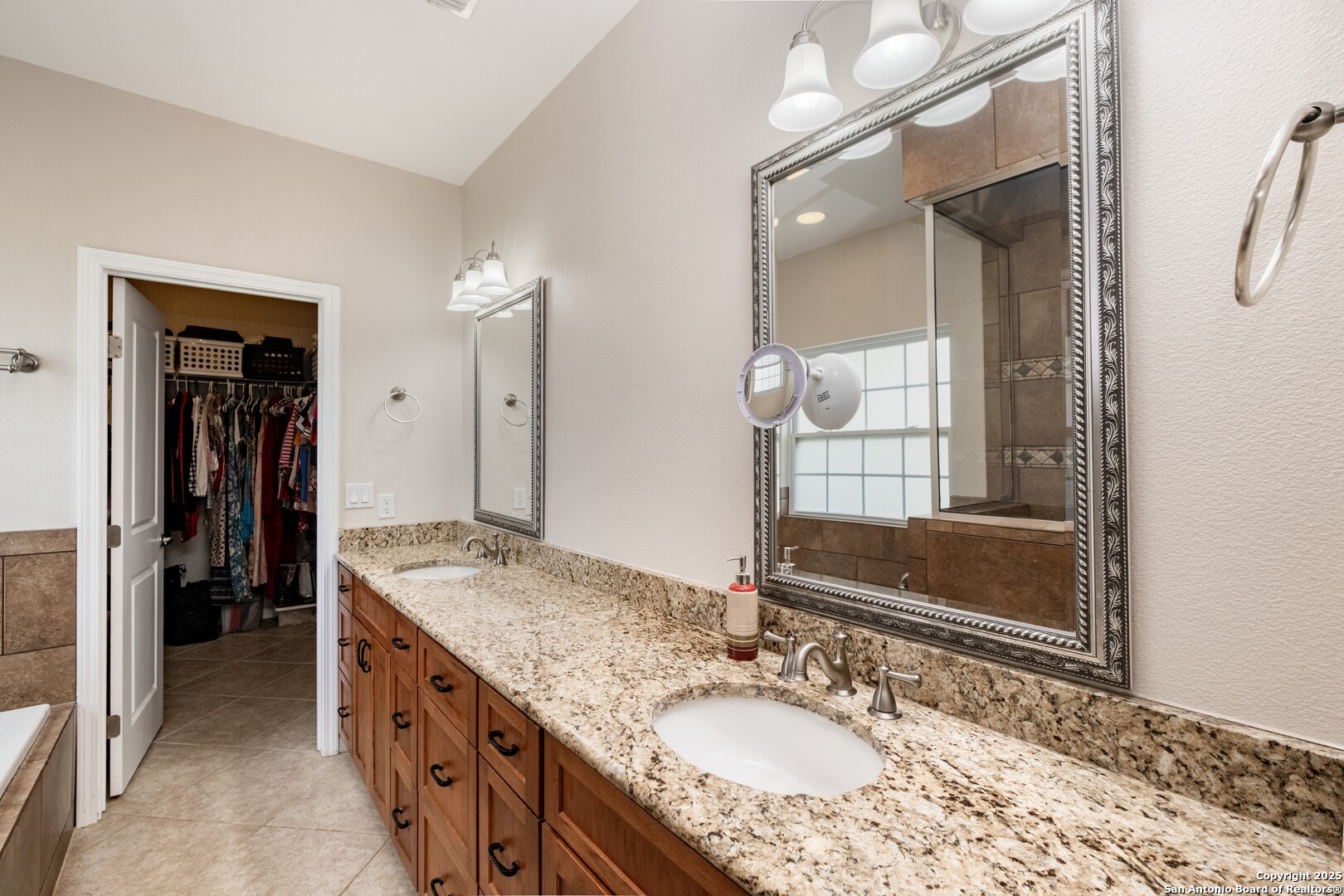 233 N Fork Bandera, TX 78003 - Photo 20 of 71 a bathroom with a granite countertop sink mirror and double