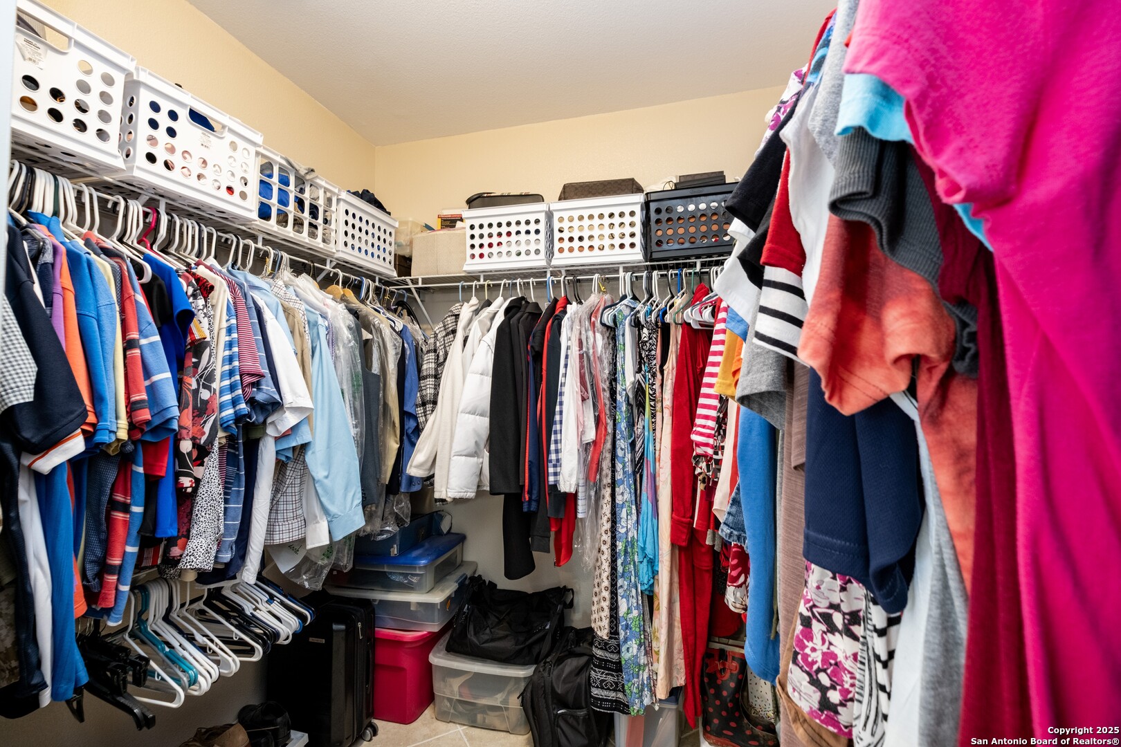 233 N Fork Bandera, TX 78003 - Photo 23 of 71 a view of walk in closet with clothes