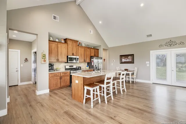 a view of front door of house with seating space