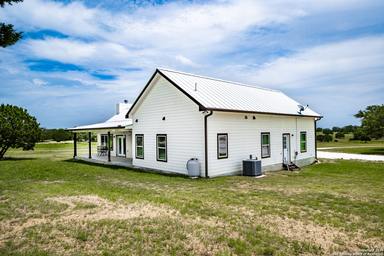 233 N Fork Bandera, TX 78003 - Photo 59 of 71 a view of a house with backyard and garden