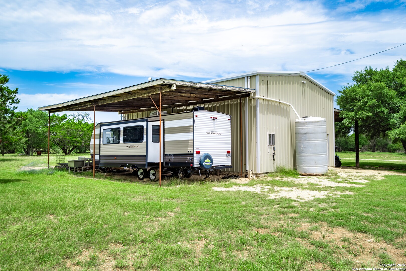 233 N Fork Bandera, TX 78003 - Photo 67 of 71 a view of a house with a yard