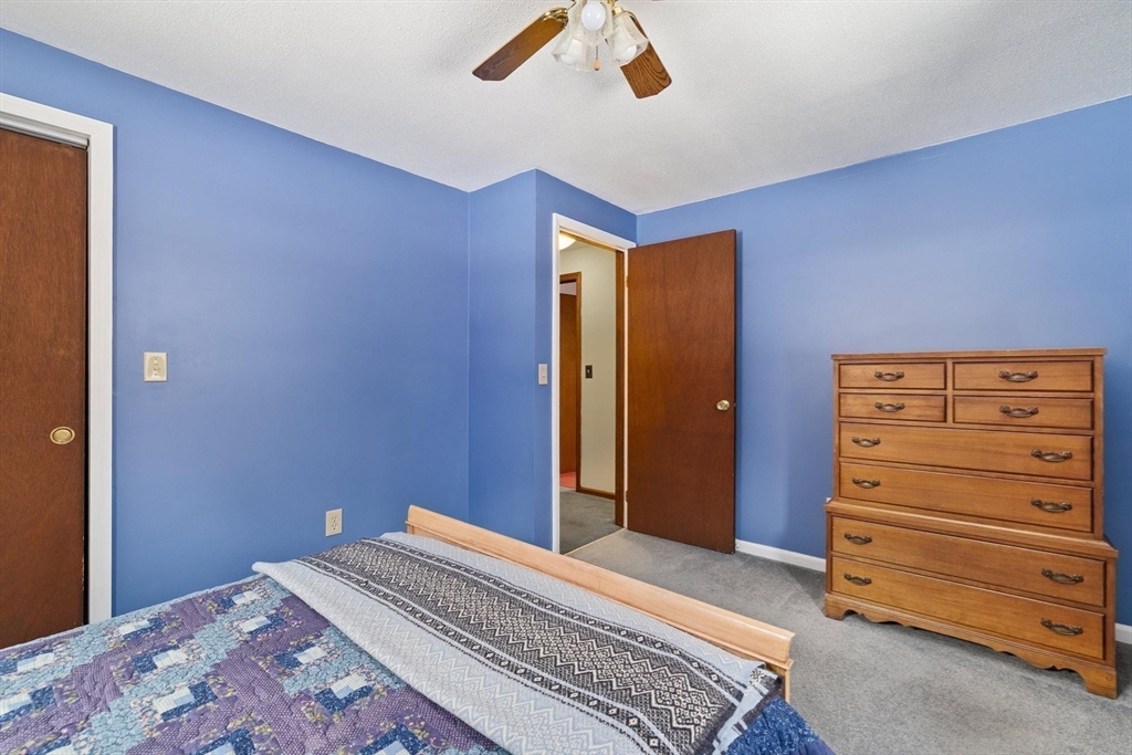 8 Cider Mill Road North Brookfield, MA 01535 - Photo 15 of 30 a bedroom with a bed and a dresser