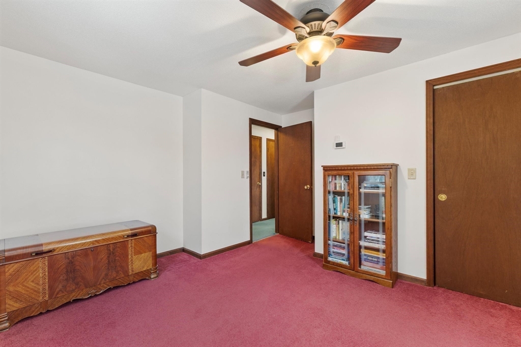 8 Cider Mill Road North Brookfield, MA 01535 - Photo 17 of 30 a view of an empty room with window and a ceiling fan